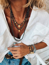 Black hematite beaded necklaces : Eye and coins