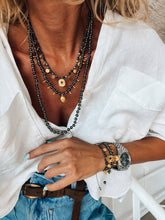 Black hematite beaded necklaces : Eye and coins