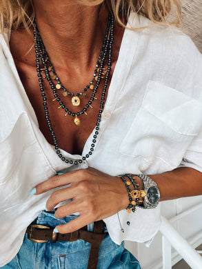 Black hematite beaded necklaces : Eye and coins