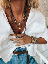 Black hematite beaded necklaces : Eye and coins