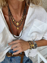 Black hematite beaded necklaces : Eye and coins