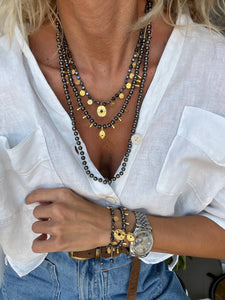 Black hematite beaded necklaces : Eye and coins