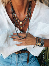 Black hematite beaded necklaces : Eye and coins